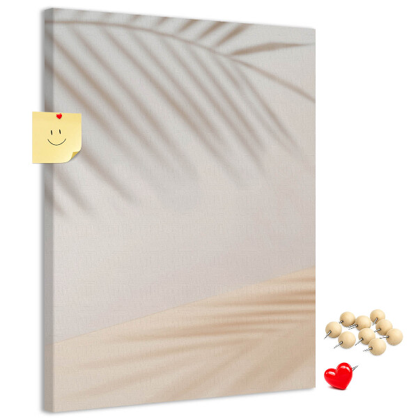 Cork notice board Delicate shadows of palm trees on a light background