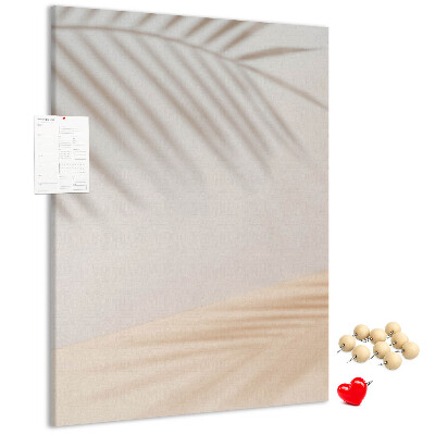 Cork notice board Delicate shadows of palm trees on a light background
