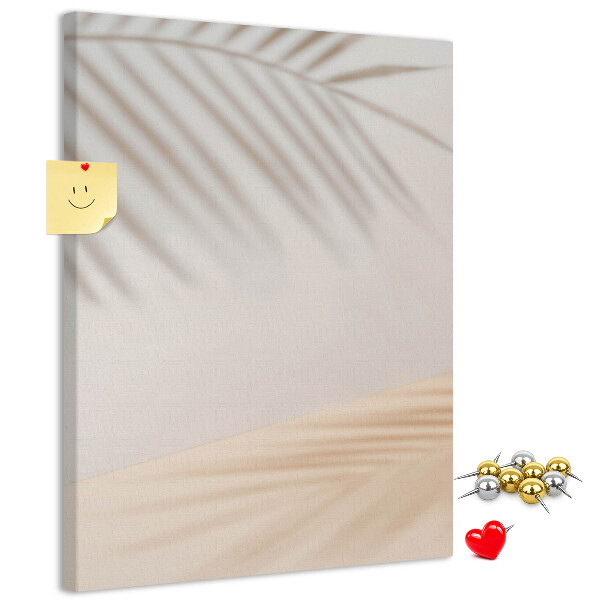 Cork notice board Delicate shadows of palm trees on a light background