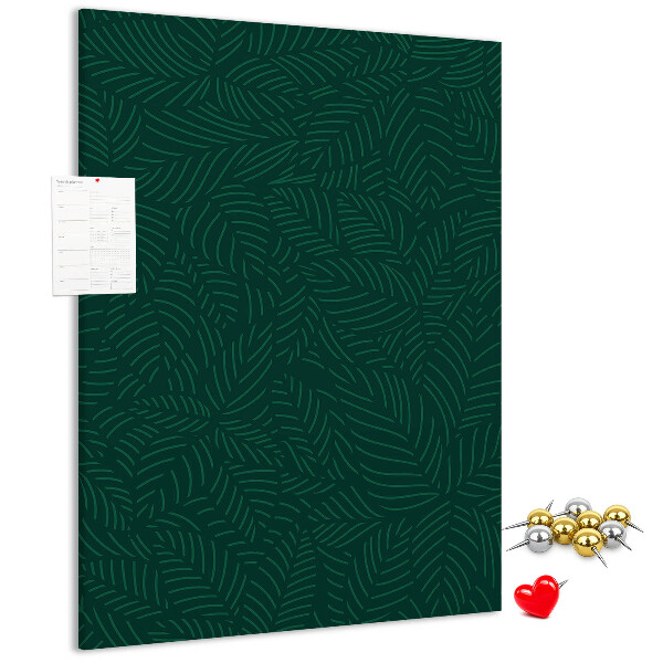Cork notice board Background with leaves on a dark green background