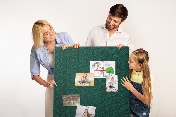 Cork notice board Background with leaves on a dark green background