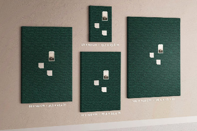 Cork notice board Background with leaves on a dark green background