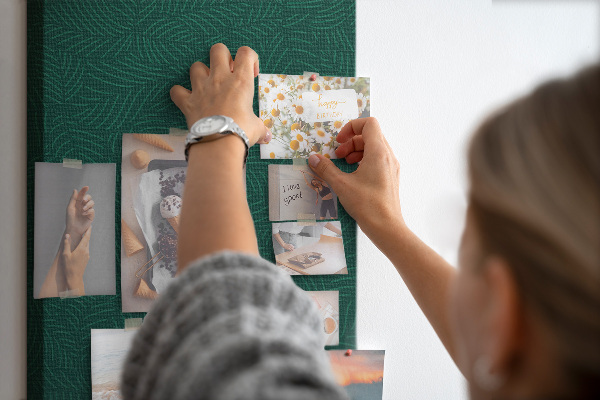 Cork notice board Background with leaves on a dark green background