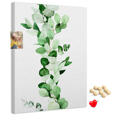 Cork notice board Green leaves on a light background