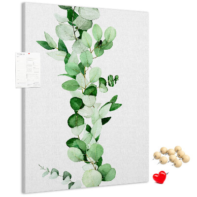 Cork notice board Green leaves on a light background