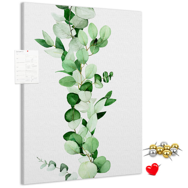 Cork notice board Green leaves on a light background