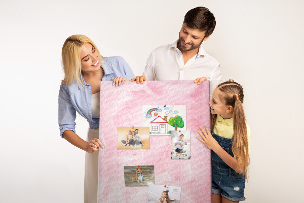 Wall cork memo board Delicate pink feathers on the background