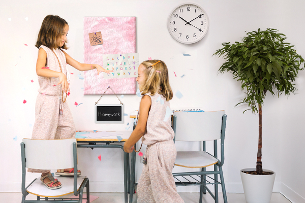 Wall cork memo board Delicate pink feathers on the background