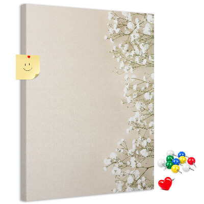 Pin board Delicate flowers on a neutral background