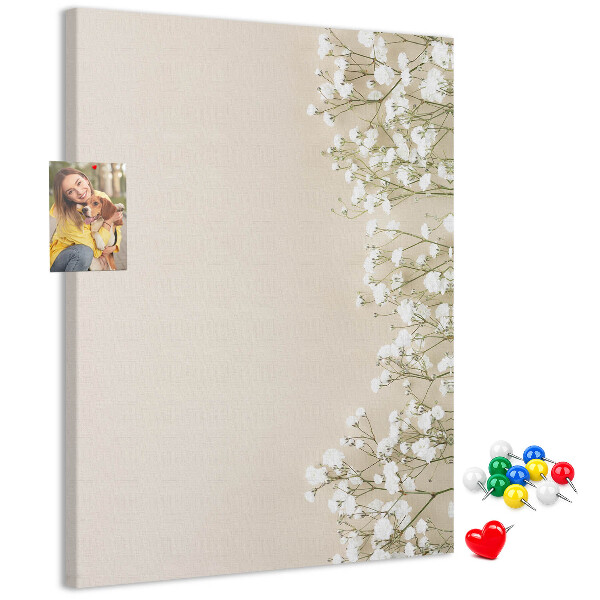 Pin board Delicate flowers on a neutral background