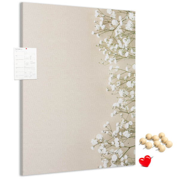 Pin board Delicate flowers on a neutral background