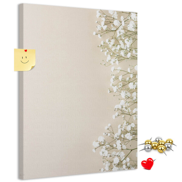 Pin board Delicate flowers on a neutral background