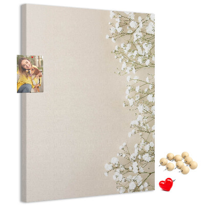 Pin board Delicate flowers on a neutral background