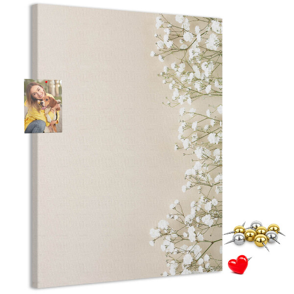 Pin board Delicate flowers on a neutral background