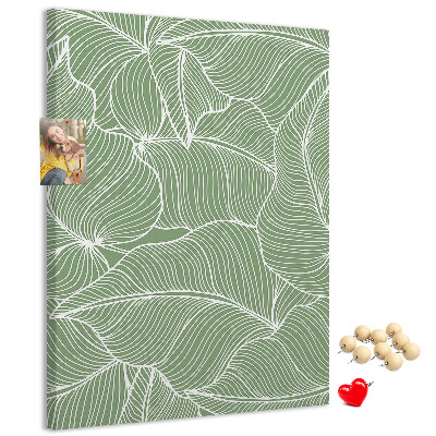 Cork notice board Delicate leaves on a green background