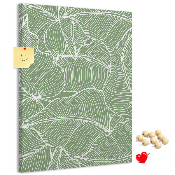 Cork notice board Delicate leaves on a green background