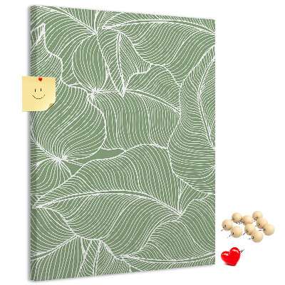 Cork notice board Delicate leaves on a green background