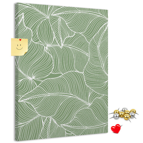Cork notice board Delicate leaves on a green background