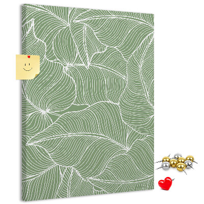 Cork notice board Delicate leaves on a green background