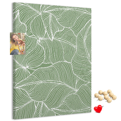 Cork notice board Delicate leaves on a green background