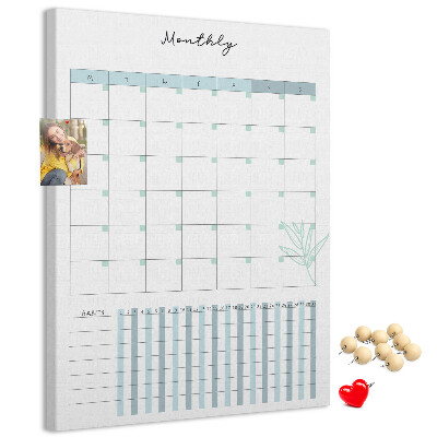 Cork notice board Monthly planning with a delicate floral accent