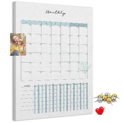 Cork notice board Monthly planning with a delicate floral accent