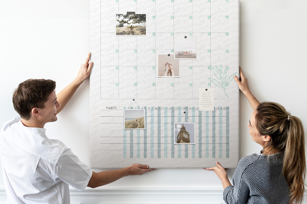 Cork notice board Monthly planning with a delicate floral accent
