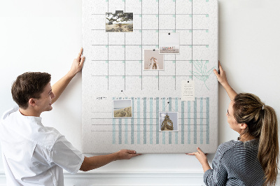 Cork notice board Monthly planning with a delicate floral accent