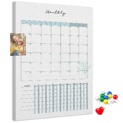 Cork notice board Monthly planning with a delicate floral accent