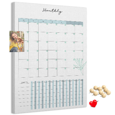 Cork notice board Monthly planning with a delicate floral accent