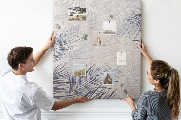 Wall cork memo board Delicate leaves on a gray background