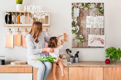 Memo cork board Flowers on a background of wooden boards