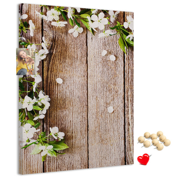 Memo cork board Flowers on a background of wooden boards