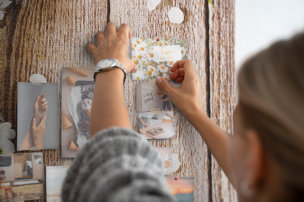Memo cork board Flowers on a background of wooden boards
