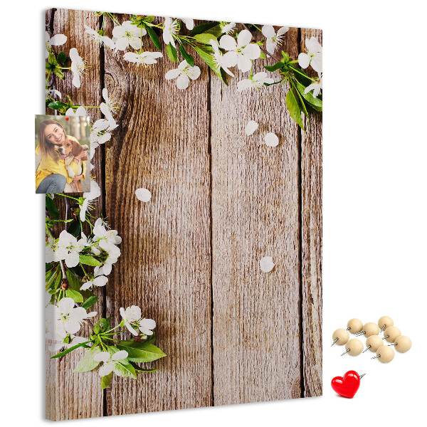 Memo cork board Flowers on a background of wooden boards
