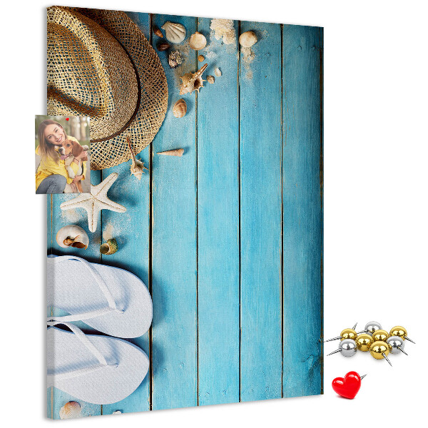 Pin board Summer accessories on a blue wood background