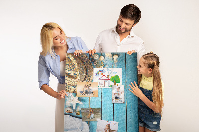 Pin board Summer accessories on a blue wood background