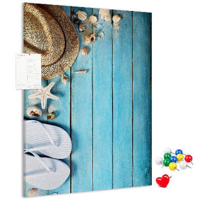 Pin board Summer accessories on a blue wood background
