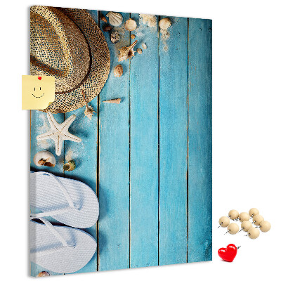 Pin board Summer accessories on a blue wood background