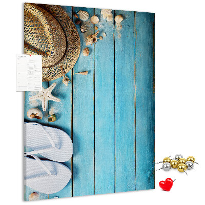 Pin board Summer accessories on a blue wood background