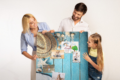 Pin board Summer accessories on a blue wood background