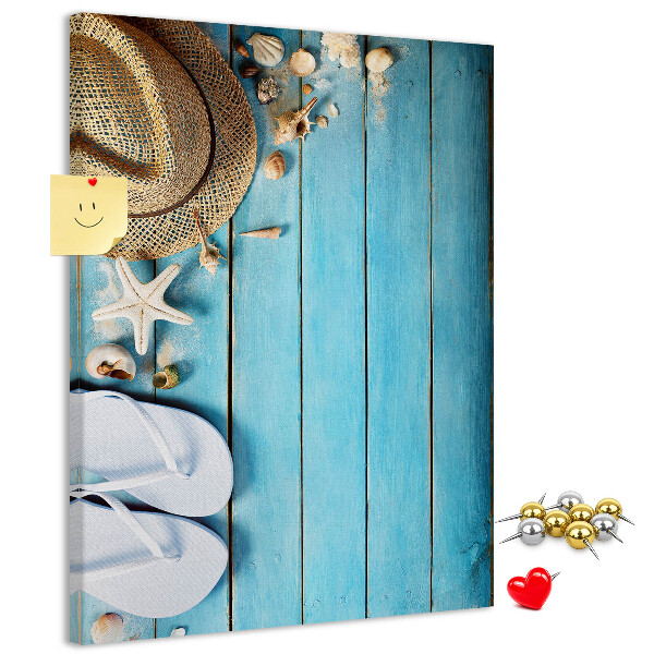 Pin board Summer accessories on a blue wood background