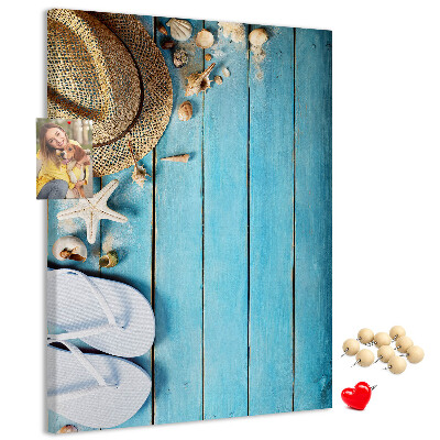 Pin board Summer accessories on a blue wood background