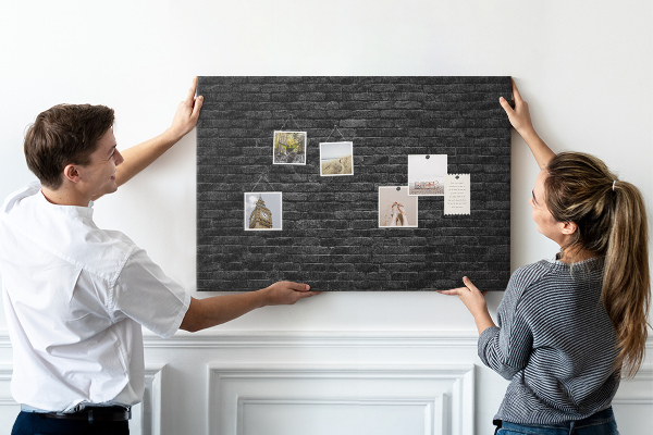 Cork display board Dark brick wall