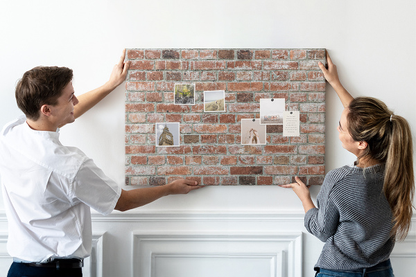 Cork memo board Brick wall