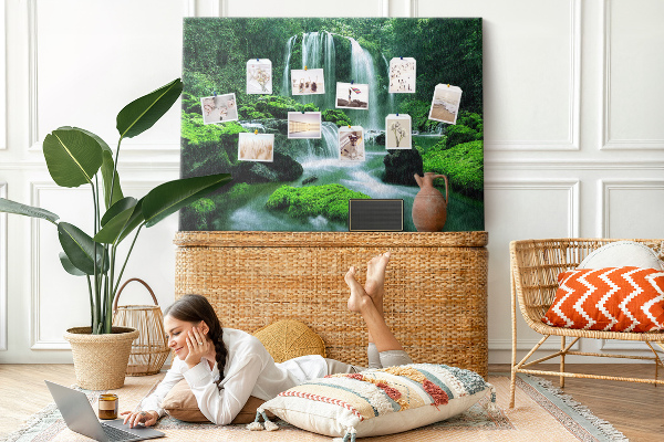 Cork board Waterfall among moss
