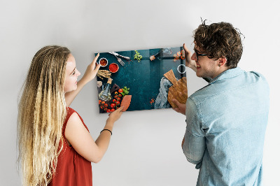 Magnetic wall board for kitchen utensils