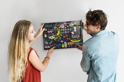 Magnetic board for wall with an abstract inscription design