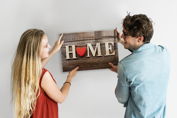 Magnetic wall board with house inscription