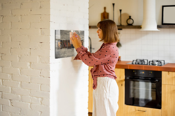 Magnetic board for wall with family inscription design